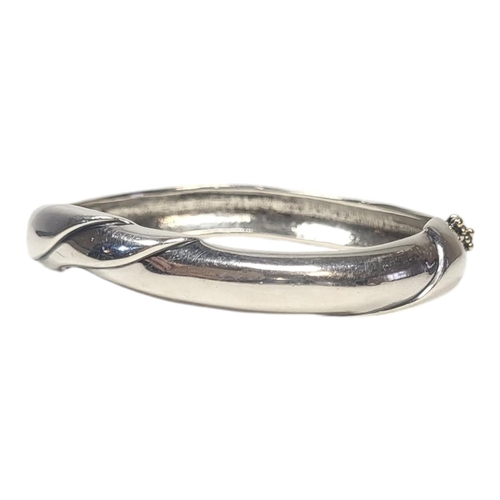 574 - GEORG JENSEN, A 20TH CENTURY DANISH SILVER BANGLE
Rope twist with berries, marked ‘925 S Denmark 332... 