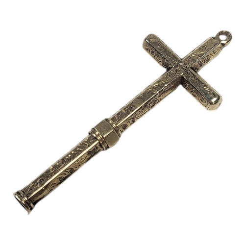 588 - A 19TH CENTURY YELLOW METAL CRUCIFIX PROPELLING PENCIL
Having engraved decoration and hanging bale.
... 