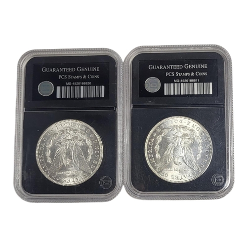 596 - TWO 19TH CENTURY AMERICAN SILVER UNCIRCULATED MORGAN ONE DOLLAR COINS, DATED1886 AND 1889
In protect... 