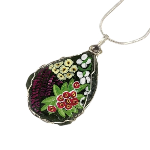 612 - A MODERN ITALIAN DESIGN STERLING SILVER .925 MOUNTED MILLEFIORI ENAMELLED STONE PENDANT
On Sterling ... 