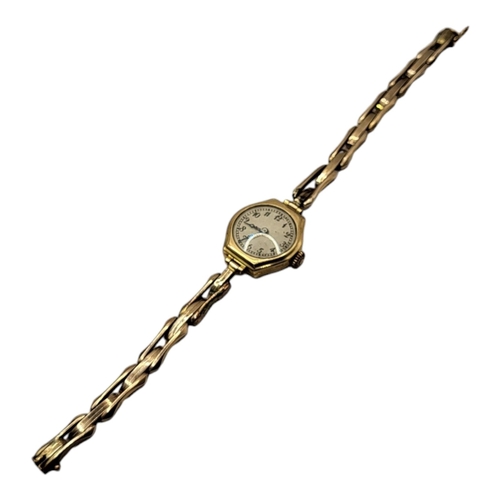 688 - AN EARLY 20TH CENTURY 9CT GOLD LADIES’ COCKTAIL WATCH
Silver tone dial, on expanding bracelet strap,... 