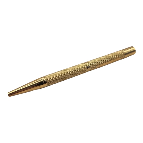 690 - BAKER’S POINTER, AN EARLY 20TH CENTURY 9CT GOLD PROPELLING PENCIL
Heavy gauge with engine turned dec... 