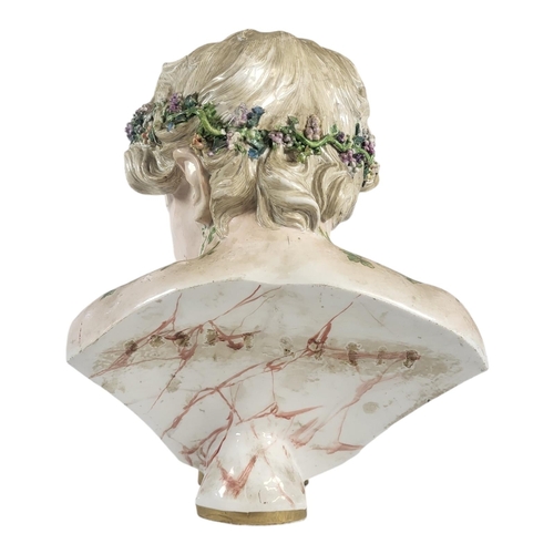 707 - AFTER MEISSEN, A LARGE 19TH CENTURY ‘KINDERKOPF’ PORCELAIN BUST
Young Bacchus wearing a wreath of vi... 