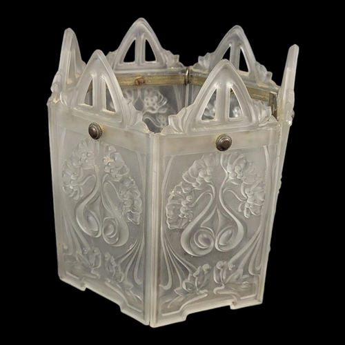 719 - AN EARLY 20TH CENTURY FROSTED GLASS HANGING LANTERN
Six panels embossed with Art Nouveau floral desi... 