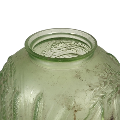 720 - JOBLIN, A LARGE ART DECO BIRD AND CORN GREEN GLASS VASE
Embossed with a bird in flight with corn.
(a... 