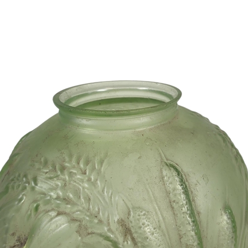 720 - JOBLIN, A LARGE ART DECO BIRD AND CORN GREEN GLASS VASE
Embossed with a bird in flight with corn.
(a... 