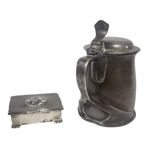 721 - ARCHIBALD KNOX FOR LIBERTY, AN EARLY TUDRIC RANGE CELTIC REVIVAL PEWTER TANKARD, CIRCA 1900
Stamped ... 