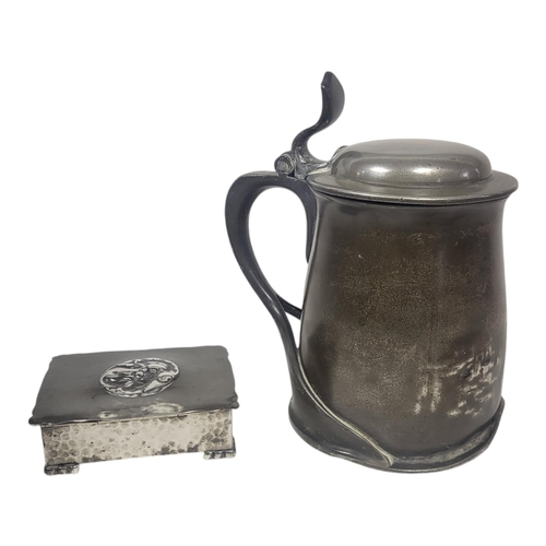 721 - ARCHIBALD KNOX FOR LIBERTY, AN EARLY TUDRIC RANGE CELTIC REVIVAL PEWTER TANKARD, CIRCA 1900
Stamped ... 