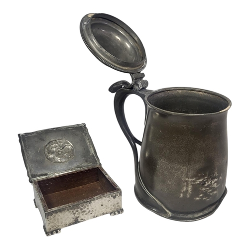 721 - ARCHIBALD KNOX FOR LIBERTY, AN EARLY TUDRIC RANGE CELTIC REVIVAL PEWTER TANKARD, CIRCA 1900
Stamped ... 