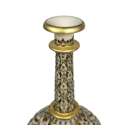 724 - A FINE INDO-PERSIAN ARABESQUE ALABASTER JEWELLED ROSE WATER SPRINKLER, CIRCA 1900
Alabaster bottle s... 