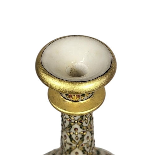 724 - A FINE INDO-PERSIAN ARABESQUE ALABASTER JEWELLED ROSE WATER SPRINKLER, CIRCA 1900
Alabaster bottle s... 