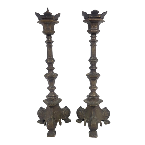 733 - A PAIR OF 19TH CENTURY BRONZE PRICKET CANDLESTICKS
Having a coronet finial, on scrolled tripod feet.... 