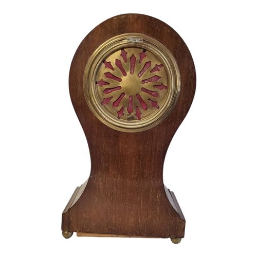 842 - AN EDWARDIAN MAHOGANY INLAID ‘BALLOON’ BEDROOM CLOCK
Having inlaid shell design to case, striking mo... 