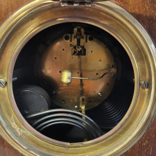 842 - AN EDWARDIAN MAHOGANY INLAID ‘BALLOON’ BEDROOM CLOCK
Having inlaid shell design to case, striking mo... 