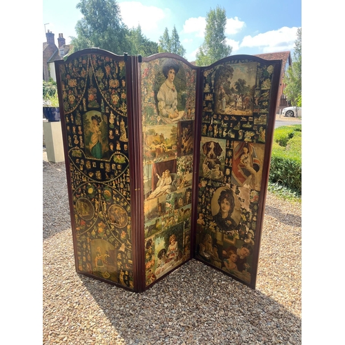 470 - A LATE VICTORIAN MAHOGANY FRAMED THREE FOLD DECOUPAGE DECORATED DRESSING SCREEN, DOUBLE SIDED.
(w 21... 