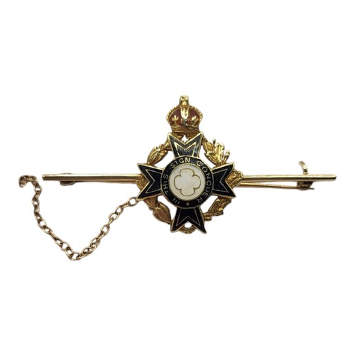 563A - AN EARLY 20TH CENTURY 9CT GOLD AND ENAMEL BRITISH ARMY CHAPLAIN BROOCH
The red coronet with blue and... 