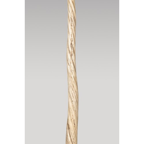 213 - A LATE 19TH CENTURY NARWHAL TUSK (MONODON MONOCEROS).
Mounted upon a custom stand. Tusk (215cm). Con... 