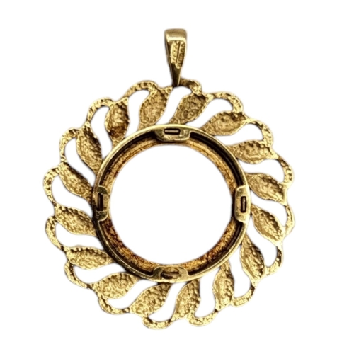 4 - A VINTAGE 9CT GOLD PENDANT COIN MOUNT
The pierced leaf design on a fine box link chain.
(pendant app... 