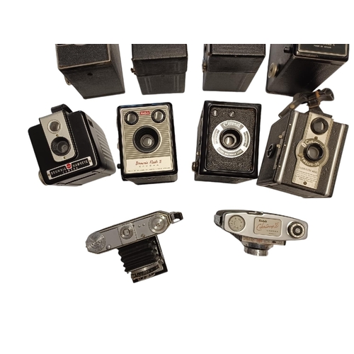 180A - EXA II 35mm SLR, VINTAGE KODAK AND CORONET FILM CAMERAS. Along with a Kershaw King Penguine, Dacora,... 