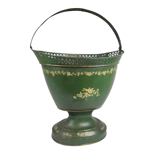 291 - A 19TH CENTURY TOLEWARE BASKET
The single carry handle with hand painted floral decoration on green ... 