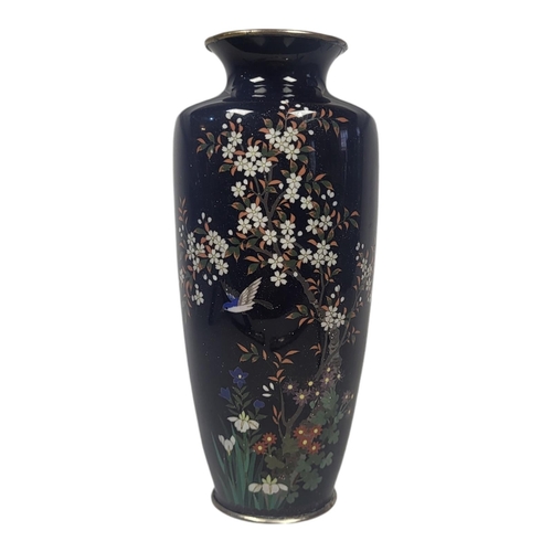 224 - A 19TH CENTURY JAPANESE MEIJI CLOISONNÉ VASE
Fine decoration of an exotic bird with fauna, on a dark... 