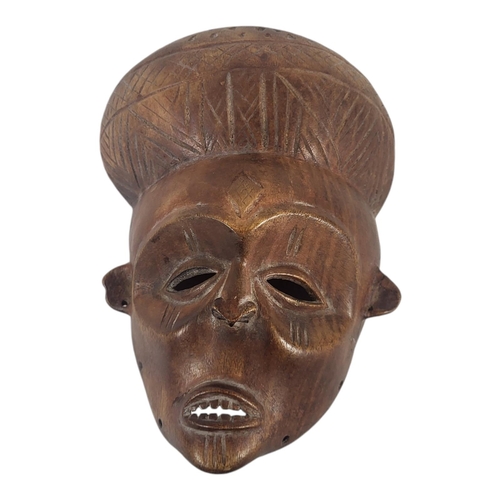 233 - A WEST AFRICAN TRIBAL ART EARLY 20TH CENTURY BAULE TYPE WOODEN CEREMONIAL MASK (POSSIBLY IVORY COAST... 