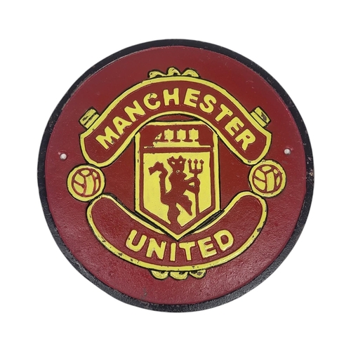 225 - FOOTBALL MEMORABILIA INTEREST, MANCHESTER UNITED FOOTBALL CLUB, A CAST IRON CIRCULAR WALL PLAQUE 

P... 