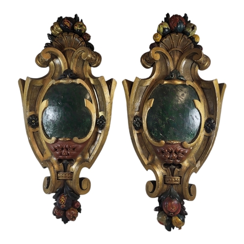 235 - A PAIR OF LATE 19TH CENTURY CONTINENTAL ROCOCO STYLE SHIELD CARTOUCHE FORM PARCEL GILT CARVED WOOD W... 