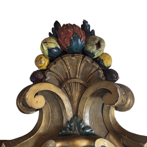 235 - A PAIR OF LATE 19TH CENTURY CONTINENTAL ROCOCO STYLE SHIELD CARTOUCHE FORM PARCEL GILT CARVED WOOD W... 