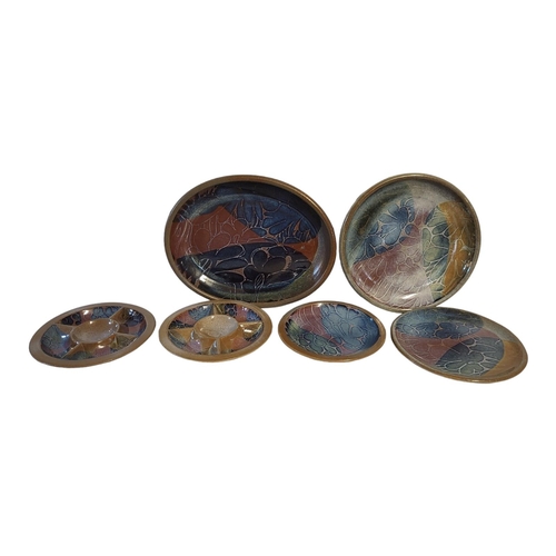 201 - CRICH POTTERY, DERBYSHIRE, A COLLECTION OF SIX STUDIO POTTERY STONEWARE DISHES
Consisting of one lar... 