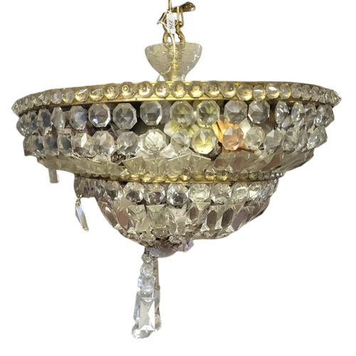 202 - AN IMPRESSIVE GILT METAL CRYSTAL CUT GLASS DROP CHANDELIER/CEILING LIGHT, CIRCA 1970/1980 
To be hun... 