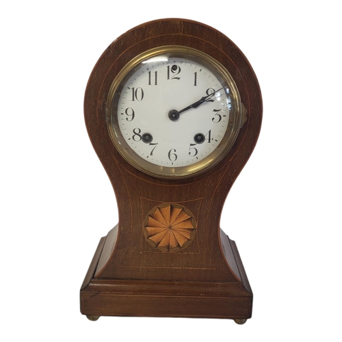 212 - AN EDWARDIAN MAHOGANY INLAID ‘BALLOON’ BEDROOM CLOCK
Having inlaid shell design to case, striking mo... 