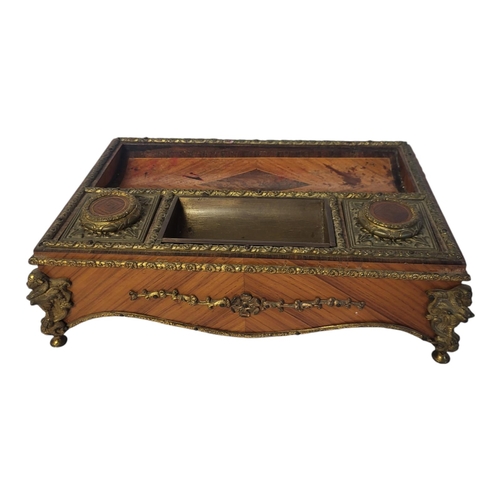 237 - A FINE 19TH CENTURY FRENCH EMPIRE STYLE TULIPWOOD VENEERED ORMOLU MOUNTED TABLETOP INKSTAND
With two... 