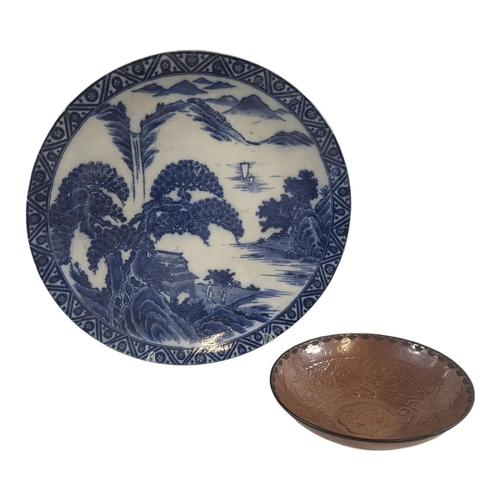 228 - A JAPANESE FUKUGAWA OF ARITA BLUE AND WHITE PORCELAIN CHARGER
Decorated in underglaze blue, with Ori... 