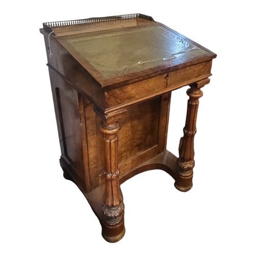 441 - A VICTORIAN MAHOGANY DAVENPORT DESK
With brass gallery, green tooled leather writing surface and fit... 