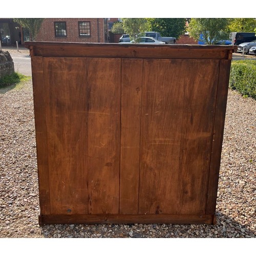 457 - A VICTORIAN MAHOGANY FLOOR STANDING BOOKCASE
The two glazed doors enclosing adjustable shelves, on p... 