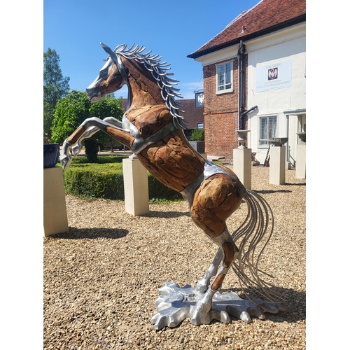 474 - AN IMPRESSIVE LIFE SIZE CAST ALUMINIUM AND DRIFTWOOD RUSTIC SCULPTURE OF A REARING THOROUGHBRED HORS... 