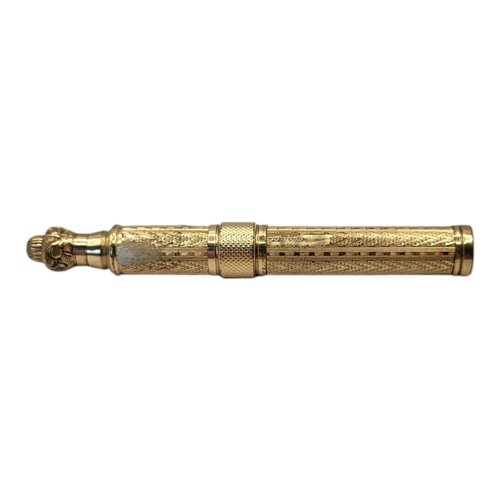 10A - A VINTAGE YELLOW METAL COMBINATION FOUNTAIN PEN AND PROPELLING PENCIL
Engraved decoration to case an... 