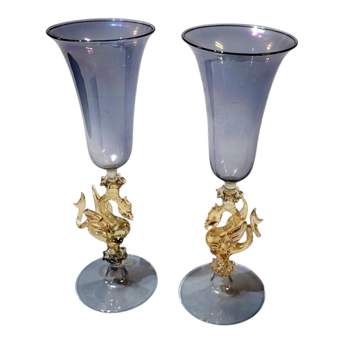 115 - AFTER 17TH CENTURY FAQON DE VENISE ORIGINAL, A PAIR OF BELL SHAPED SLIM WINE GLASSES BY SOFFIERIA PA... 