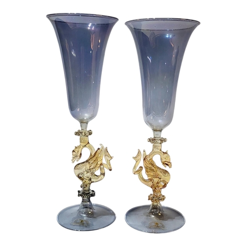 115 - AFTER 17TH CENTURY FAQON DE VENISE ORIGINAL, A PAIR OF BELL SHAPED SLIM WINE GLASSES BY SOFFIERIA PA... 