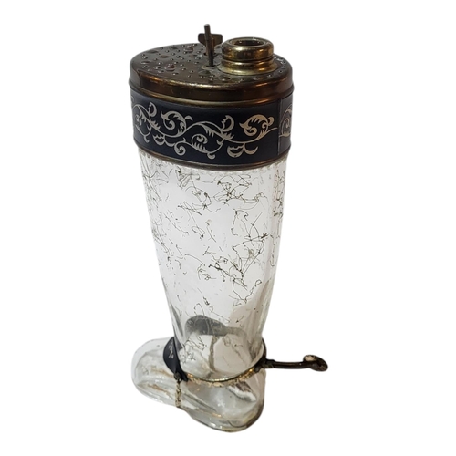 116 - AN EARLY 20TH CENTURY CONTINENTAL NOVELTY MUSICAL GLASS DECANTER MODELLED AS A RIDING BOOT, CIRCA 19... 