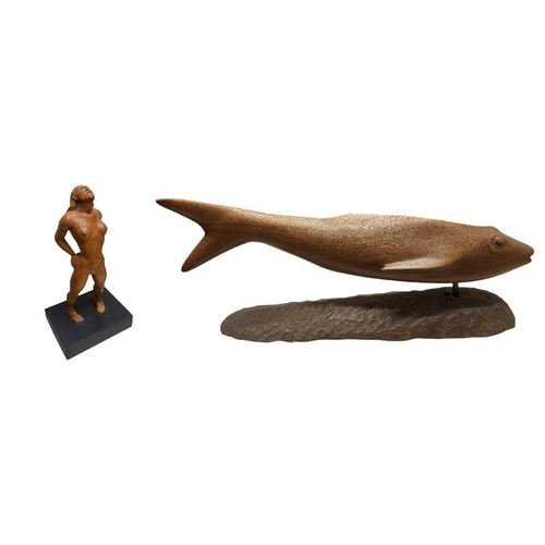 136 - A 20TH CENTURY CONTINENTAL WOODEN SCULPTURE OF DIVING SALMON
On a rustic base, together with a nude ... 