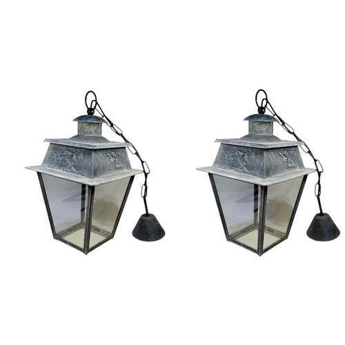 151 - A PAIR OF VICTORIAN STYLE STEEL LANTERNS
The caddy tops above four tapering glass panels.
(27cm x 27... 