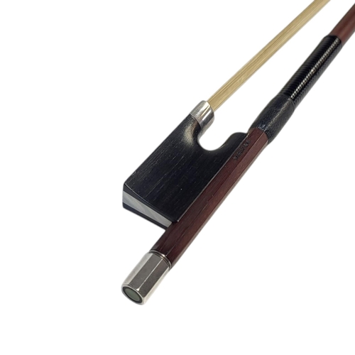 399 - W.E. HILL & SONS, A SILVER VIOLIN BOW
Round stick, ebony frog, stamped ‘W.E.H. & S’, initialled ‘LK’... 