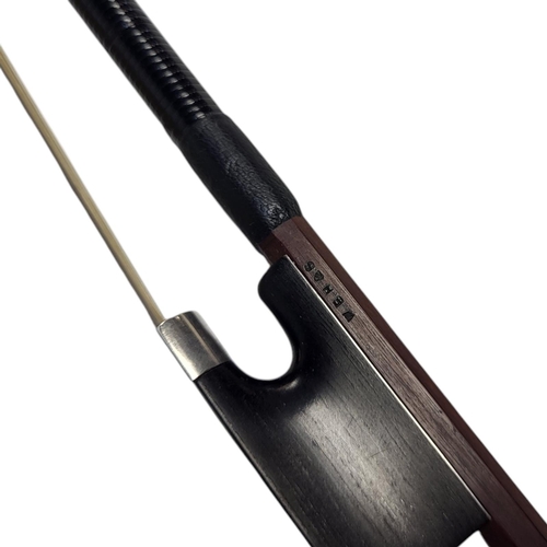 399 - W.E. HILL & SONS, A SILVER VIOLIN BOW
Round stick, ebony frog, stamped ‘W.E.H. & S’, initialled ‘LK’... 