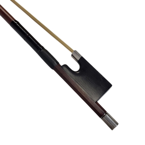 399 - W.E. HILL & SONS, A SILVER VIOLIN BOW
Round stick, ebony frog, stamped ‘W.E.H. & S’, initialled ‘LK’... 