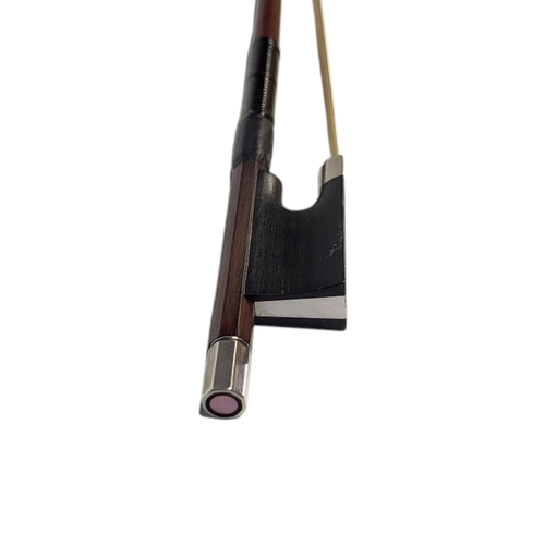 399 - W.E. HILL & SONS, A SILVER VIOLIN BOW
Round stick, ebony frog, stamped ‘W.E.H. & S’, initialled ‘LK’... 