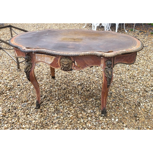 400 - IVOR NOVELLO’S WRITING TABLE, A 19TH CENTURY FRENCH KINGWOOD AND GILT BRONZE MOUNTED
The banded cart... 