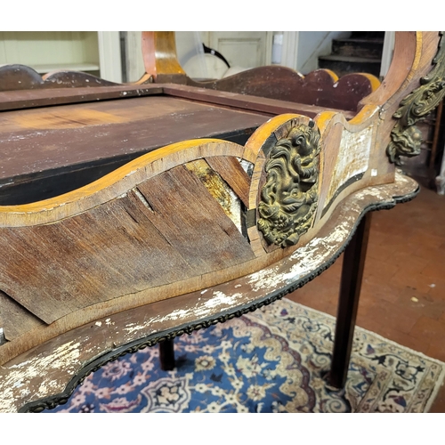 400 - IVOR NOVELLO’S WRITING TABLE, A 19TH CENTURY FRENCH KINGWOOD AND GILT BRONZE MOUNTED
The banded cart... 