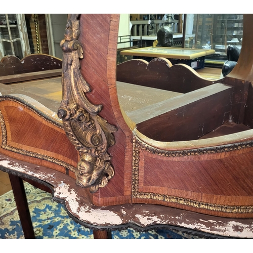 400 - IVOR NOVELLO’S WRITING TABLE, A 19TH CENTURY FRENCH KINGWOOD AND GILT BRONZE MOUNTED
The banded cart... 